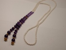 dekorativer Halsschmuck Perlen