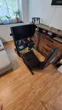 F 1 Sim Rig von Next Level  Racing mit Wheelbase und Monitor