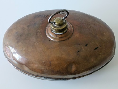 Alte wärmflasche aus kupfer - wärmflasche,