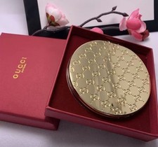 Gucci Taschenspiegel GG Logo