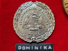 VERALTETES NICHT MEHR EXISTIERENDES POLIZEI-MÜTZENABZEICHEN COMMONWEALTH OF DOMINICA - HERSTELLER FIRMIN LONDON