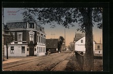 AK Uetersen, Strasse Grosser Sand mit Brot-Fabrik und Essig´s Spirituosen-Gesch 