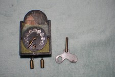 Antike Bilderwanduhr mit