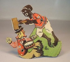 Klicker Knacker Blech 60er Jahre schwarze Frau schlägt dem Affen auf die Trommel