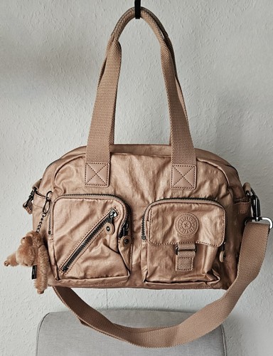 Kipling defea burnt - kipling, *burnt