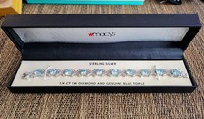 Macys 1/4 CT TW Diamond And Genuine Blue Topaz Sterling Silver Bracelet