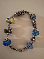 Pandora Armband  21 cm mit 9 Charms und Clips