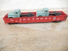 ATLAS Spur 0 Güterwagen, mit 2 ERTL LKW beladen ,