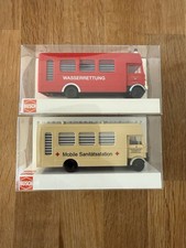 Top: 2x Busch Mercedes LP809 Automodelle Feuerwehr Sanitäter 1:87!