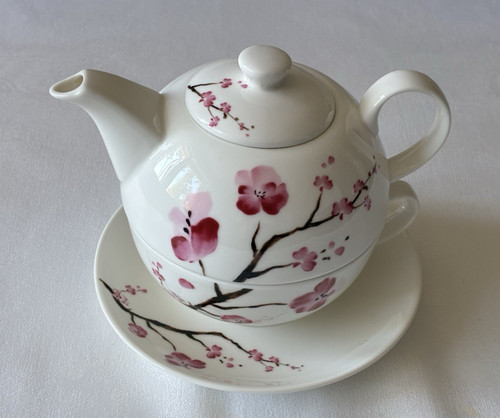 Teekanne mit tasse und - tasse,
