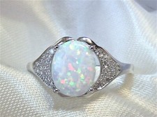 RING Edelstein FEUER-OPAL lab. WEIß 10mm oval 925 Sterling SILBER Gr. 17
