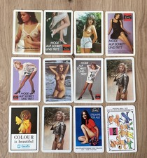 12 Stück alte DDR Taschenkalender Werbung Akt Erotik Strupfhosen