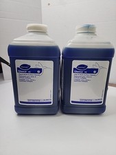 2 Bottles Of Diversey Glance