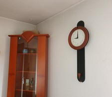 Hermle Wanduhr mit Pendel Kirschbaum moderne Form Quarz