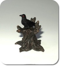 Miniatur toter Baum mit Vogel