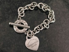 Please Return To TIFFANY "M"