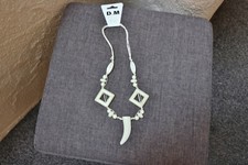 #Kette mit Zahnanhänger