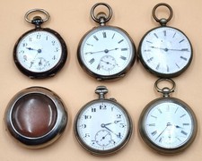 Konvolut  fünf alte Taschenuhren, Bastelware, Silber dabei und Eisenbahneruhr