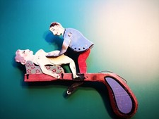 Erotisches Blechspielzeug /