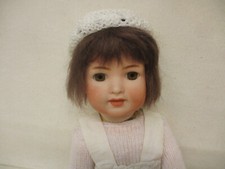 x-72878	Neuzeitliche Repro K&R Porzellankopf-Puppe L:ca.37cm