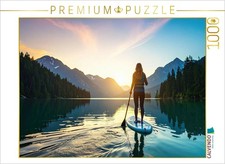 CALVENDO Puzzle Eine Frau beim SUP in einer stillen Landschaft mit Lichtstimmung