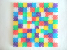 Untersetzer aus Bügelperlen,  mehrfarbig,  14 x 14 cm