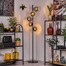 Schicke Retro Vintage Stehlampe aus schwarzem Metall und Glas mit Fußschalter