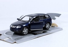 Welly Volkswagen Touareg mit beweglichen Vordertüren und Rückzugsmotor OVP