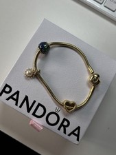 Pandora Charmarmband Gold Herzverschluss mit 3 Charms