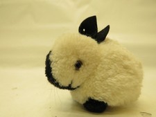 X-39312	Steiff Wollminiatur Hase, L. ca. 8 cm, ohne Knopf und Fahne