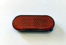Mini Reflektor Rückstrahler rot Katzenauge selbstklebend KFZ und Anhänger oval