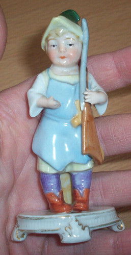 Alte porzellanfigur junge - alte,