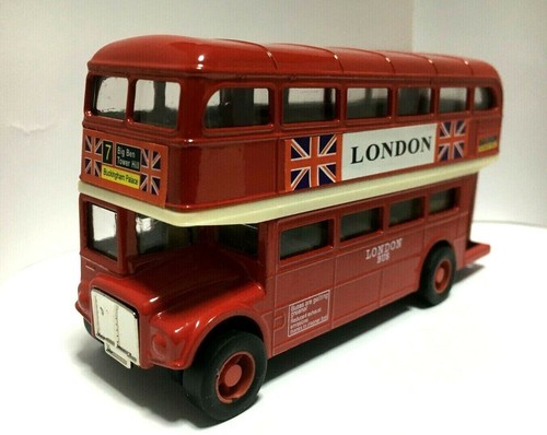 London red bus pull back - london,