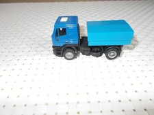 Herpa  Iveco Zugmaschine blau mit Ballastpritsche  Kirmes  Rummel