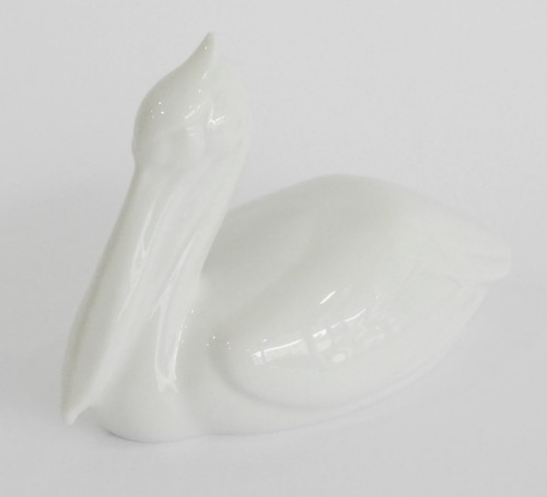 Kleine porzellanfigur pelikan - porzellanfigur,