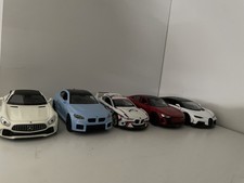 Welly, Maisto, Kinsmart Modellautos Maßstab 1:34 in neuwertigem Zustand