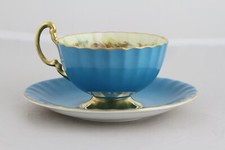 Porzellan Tasse + Untertasse