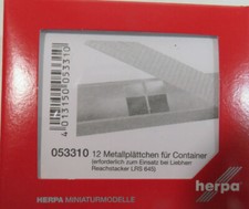 12 Metallplättchen für