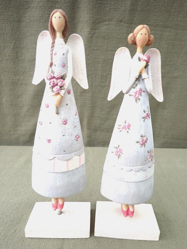 Engel figuren mit blumen auf - engel,