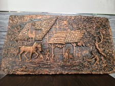 Schweres massives Kupferrelief