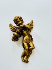 Kreative goldene Engelsstatue