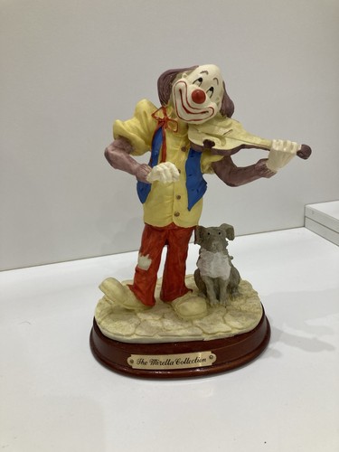 Clown mit einer geige und - clown,