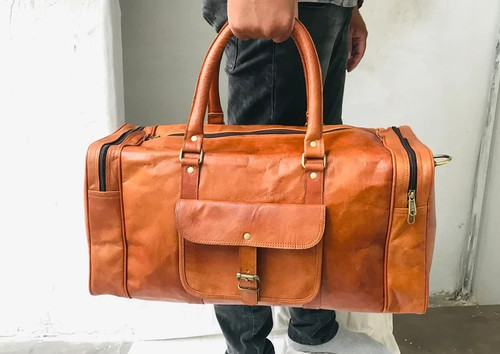 Braune reisetasche aus leder - reisetasche,