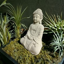 Frostsichere sitzende Buddha