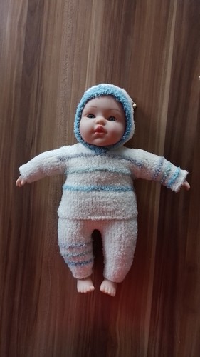 Babypuppe mit selbstgestrickte - mit,