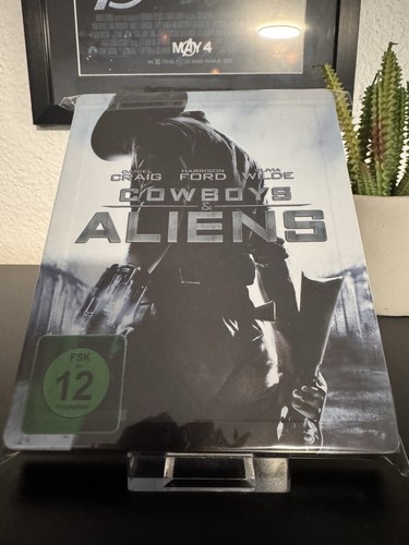 Cowboys aliens - &,