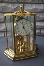 Sehr gepflegte KUNDO Drehpendeluhr Uhr Tischuhr Kaminuhr Quarz mit Glasscheiben-