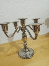 Silberfarbener Kerzenständer