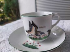 Kaffeetasse mit Falkendekor