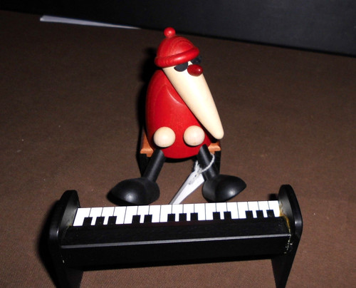 Weichnachtsmann piano - am,